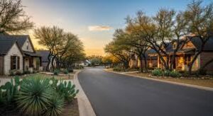 Dripping Springs TX neighborhood homes and Hill Country scenery
